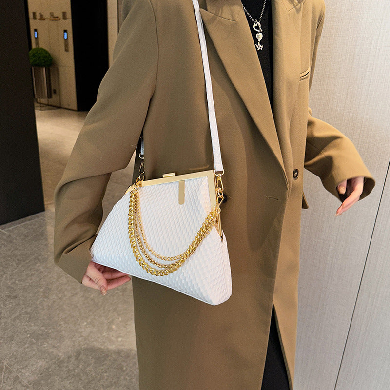 High-end socialite large-capacity clasp bag, new women's minimalist large-area embossed irregular shoulder temperament crossbody bag