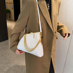 High-end socialite large-capacity clasp bag, new women's minimalist large-area embossed irregular shoulder temperament crossbody bag